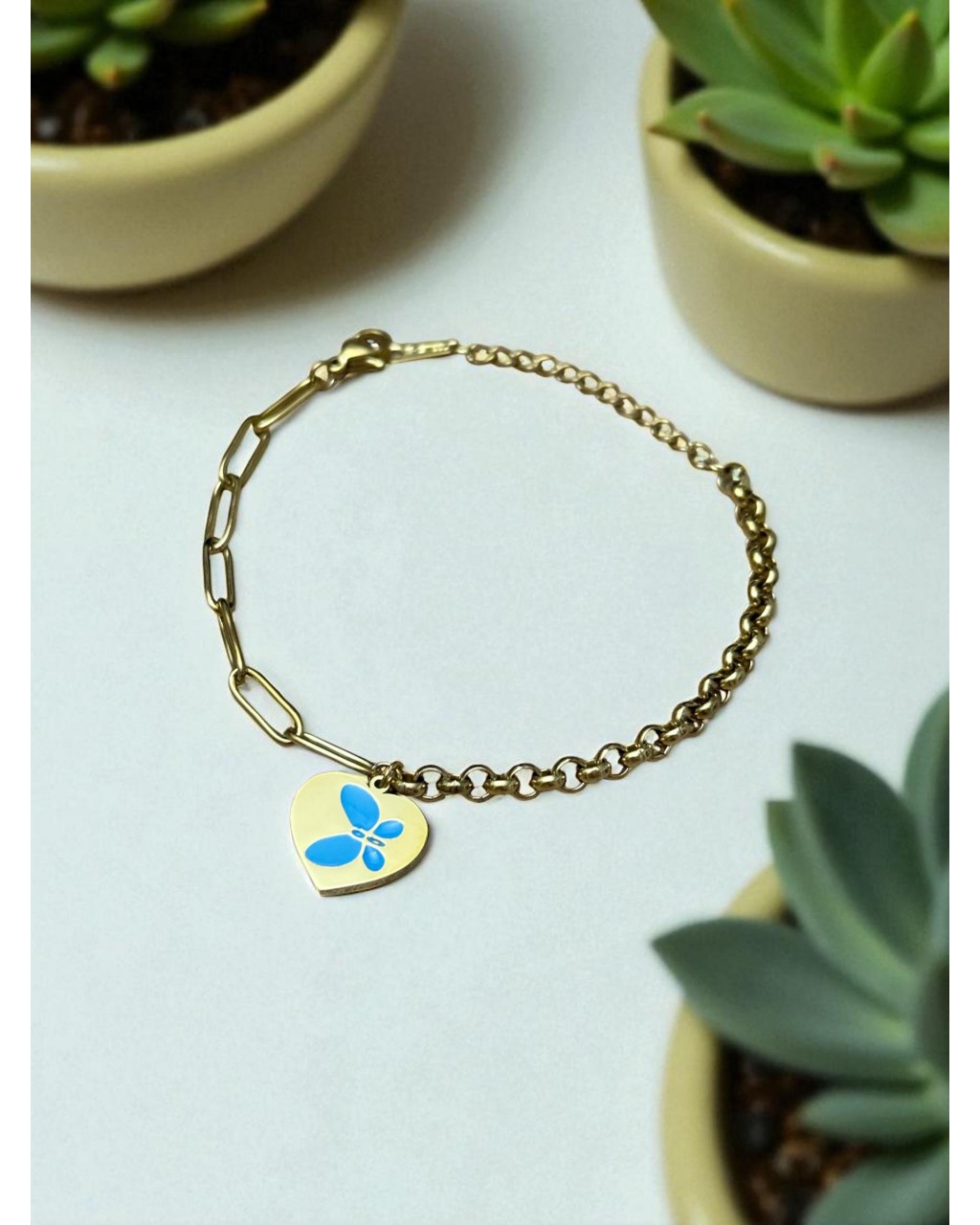 GOLD RENK SALLANTI KALP MAVİ KELEBEK MODEL ÇELİK BİLEKLİK