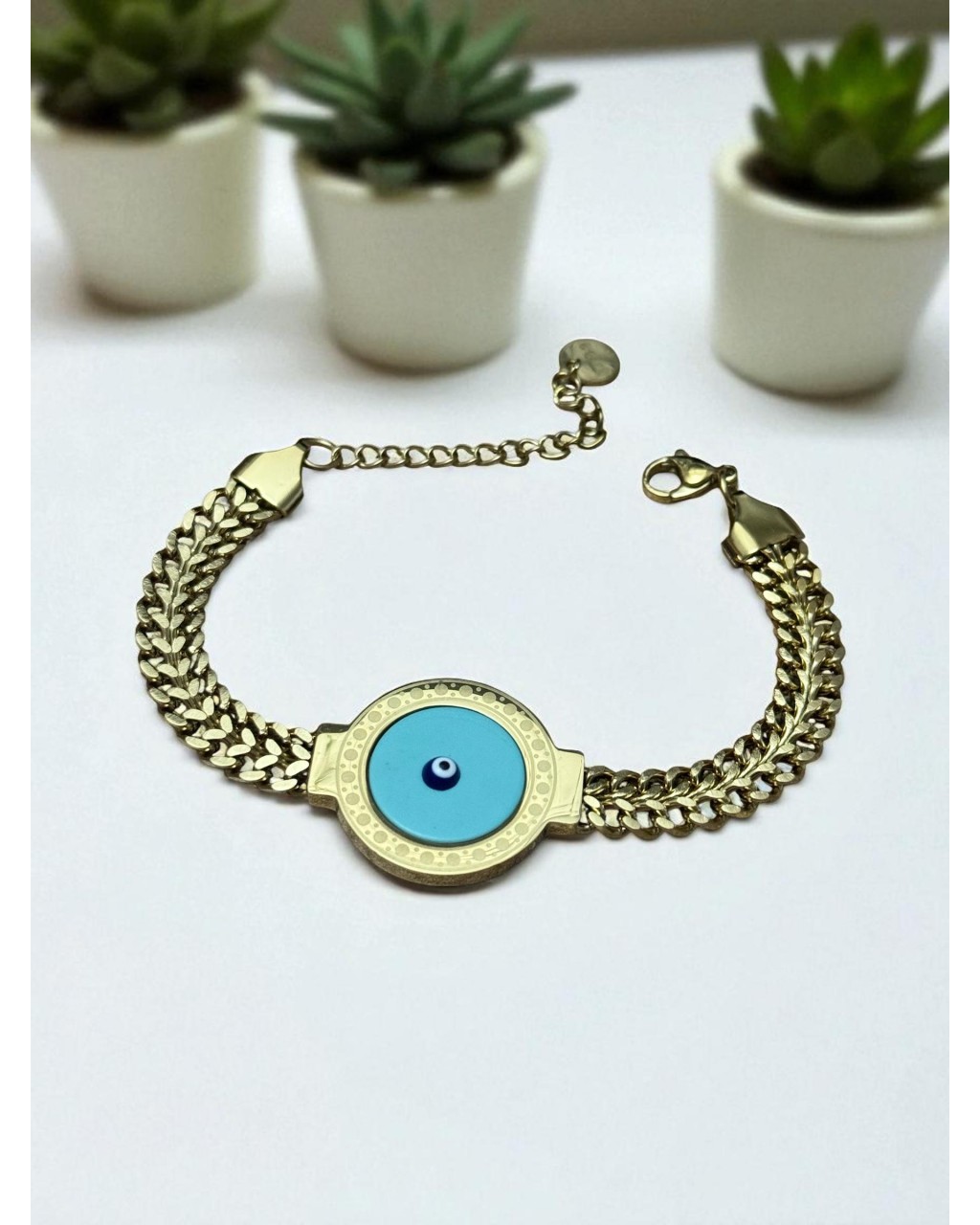 GOLD RENK SIK ZİNCİR TURKUAZ NAZARLI MODEL ÇELİK BİLEKLİK