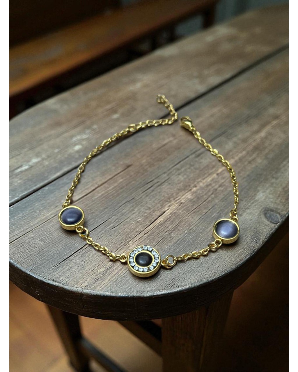 GOLD RENK SİYAH KEDİ GÖZÜ MODEL ÇELİK BİLEKLİK