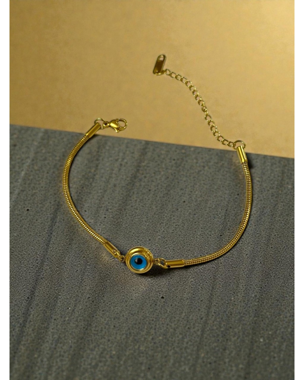 GOLD RENK NAZAR MODEL YILAN SIRTI ZİNCİR ÇELİK BİLEKLİK