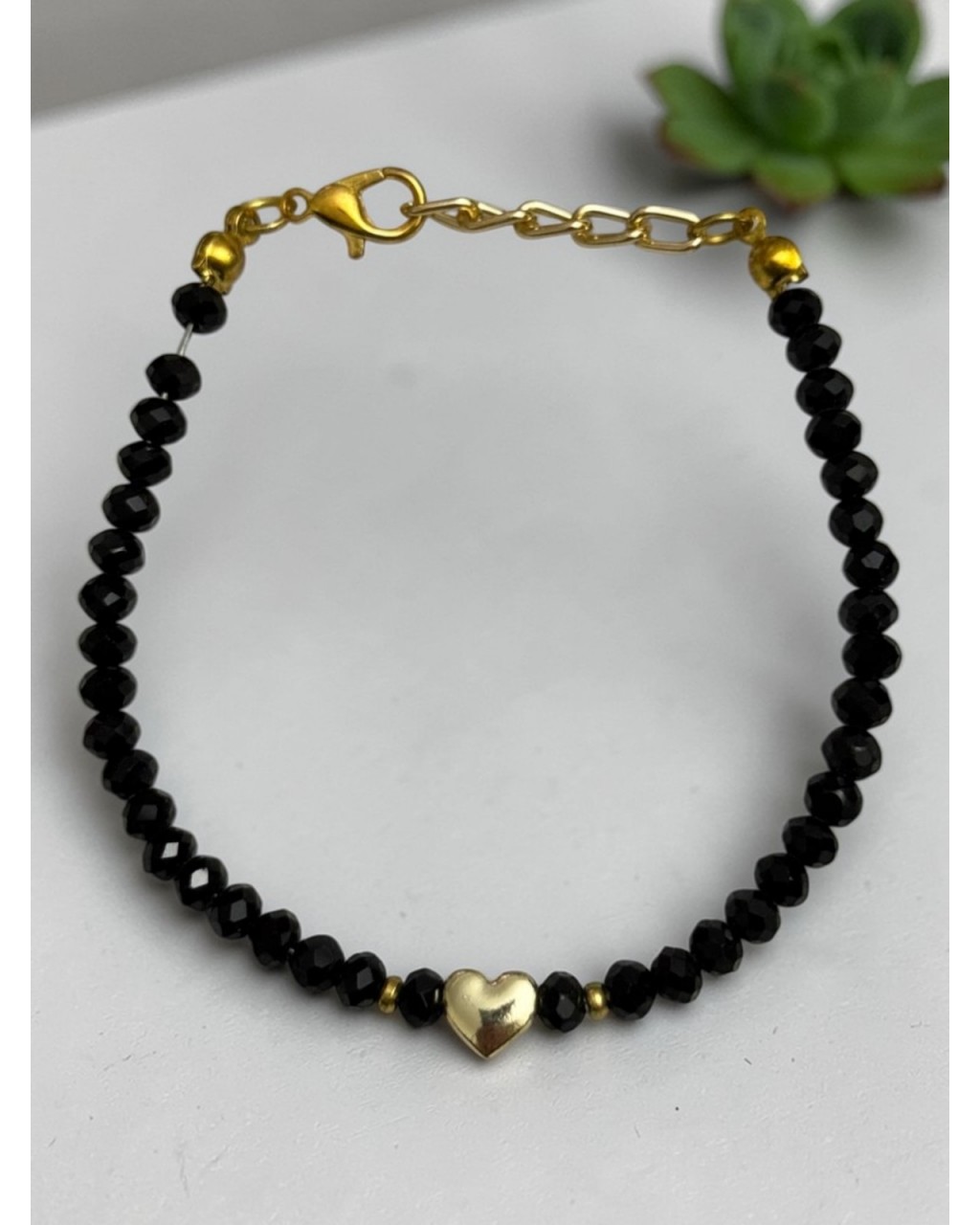 SİYAH KRİSTAL BONCUK ORTASI  KALPLİ BİLEKLİK