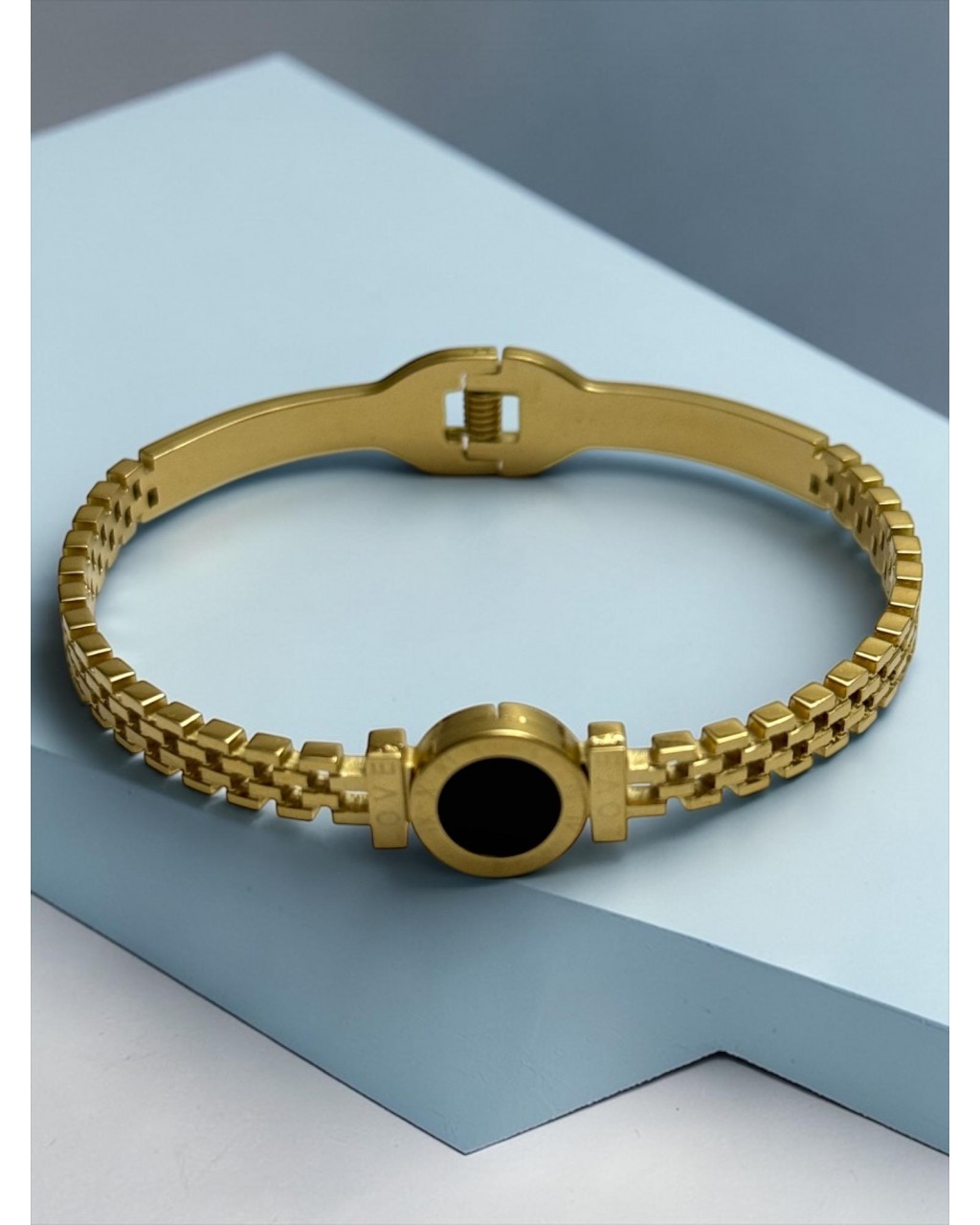 SAAT KORDON MODEL SİYAH YUVARLAK DETAYLI ÇELİK KELEPÇE BİLEKLİK