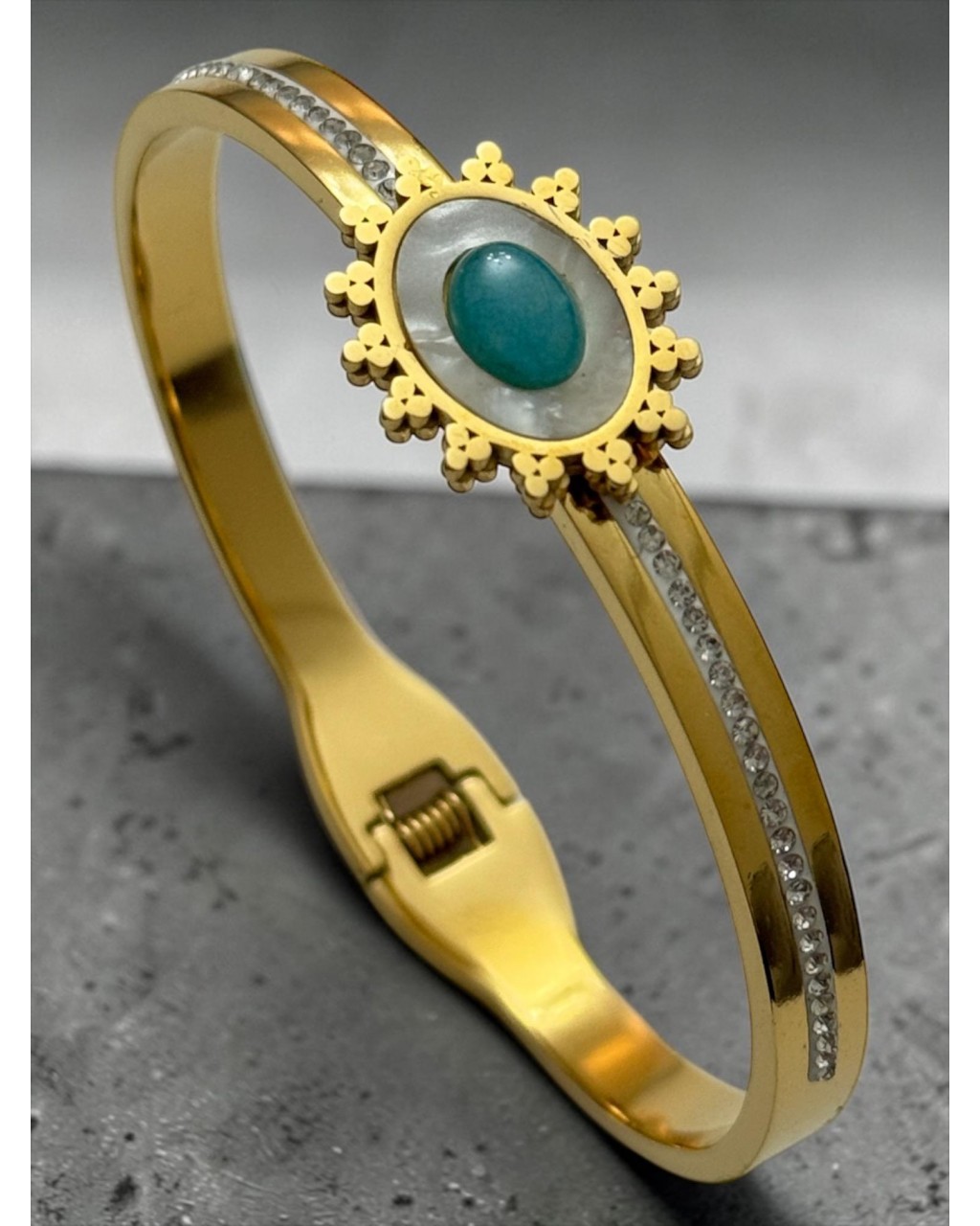 GOLD RENK ZİRKON TAŞ VE ORTASI MODELLİ SEDEF TURKUAZ TAŞLI ÇELİK KELEPÇE BİLEKLİK