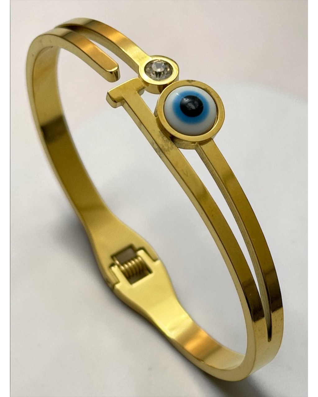 GOLD RENK NAZARLI ÇELİK KELEPÇE BİLEKLİK