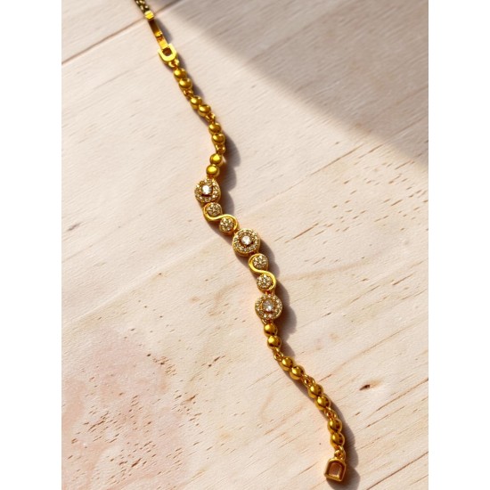 GOLD RENK YUVARLAK VE SONSUZLUK MODEL ZİRKON TAŞLI XUPING BİLEKLİK