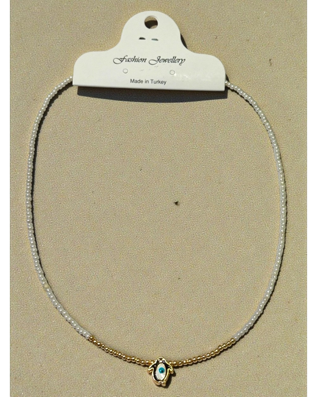 BEYAZ RENK ORTASI PENGUEN MODEL ÇELİK TELLİ KUM KOLYE