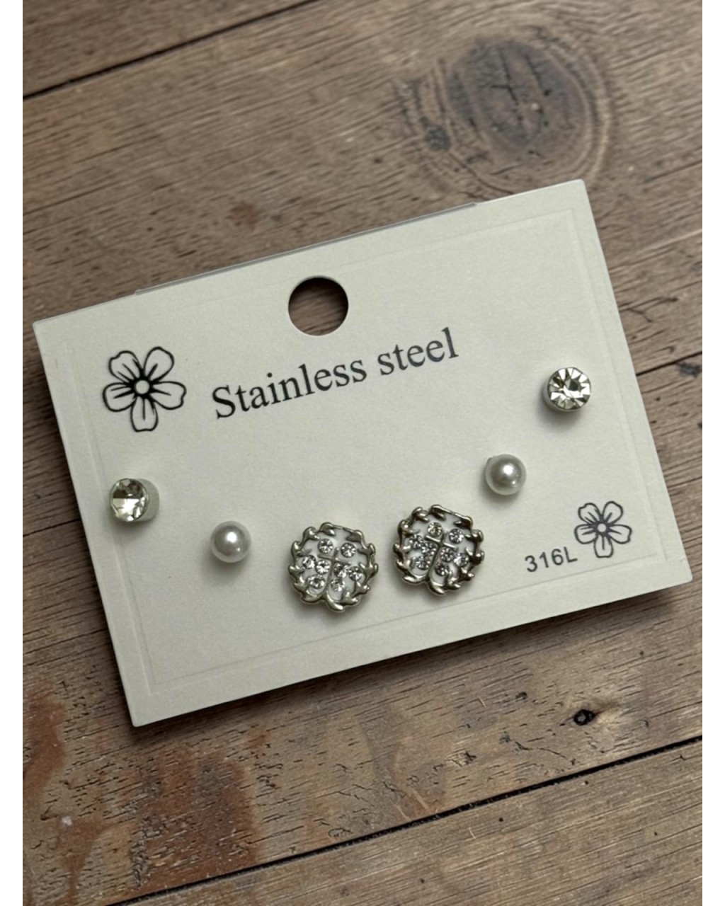 GÜMÜŞ RENK ÇİÇEKLİ MODEL ÇELİK ÇOKLU KÜPE