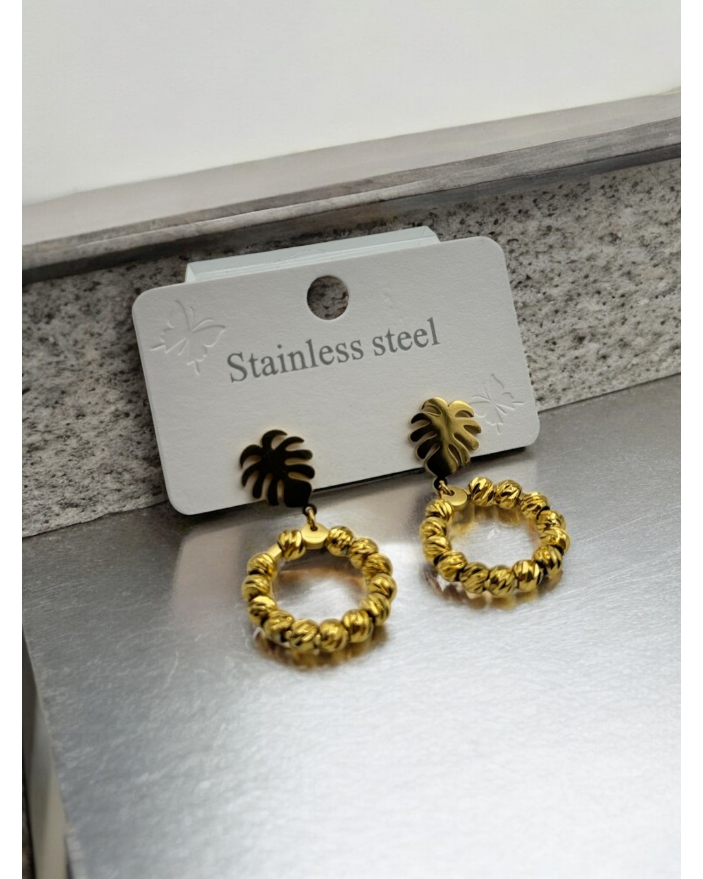 DORİKALI DEVE TABANI FİGÜRLÜ ÇELİK KÜPE