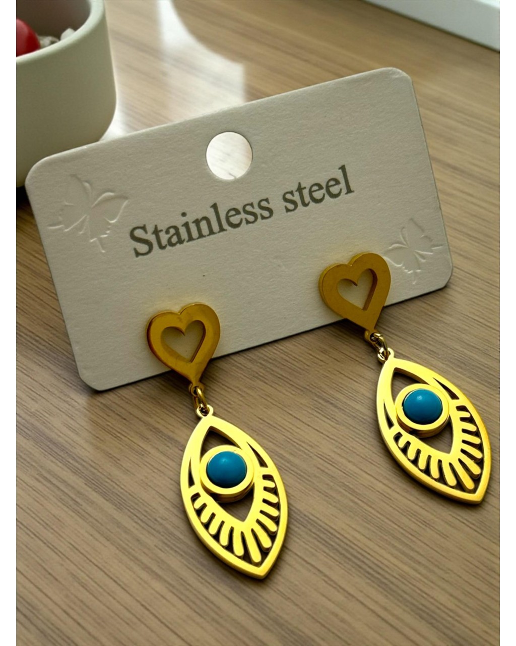 GOLD RENK KALPLİ YASSI KİRPİK GÖZ MODEL ÇELİK KÜPE