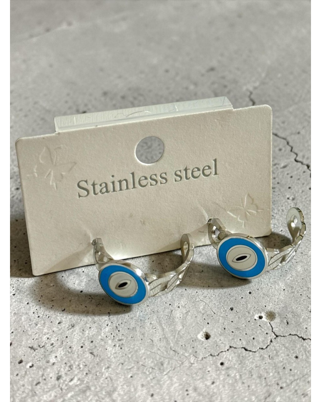 SİLVER RENK DÜĞÜM MODEL MAVİLİ ÇELİK KÜPE