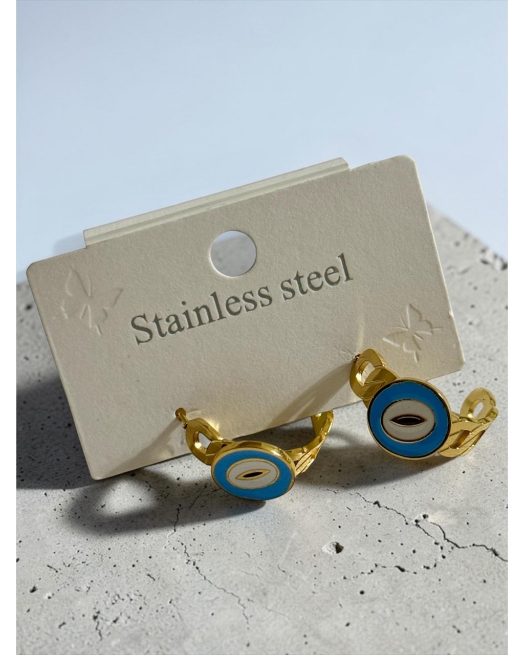 GOLD RENK DÜĞÜM MODEL MAVİLİ ÇELİK KÜPE